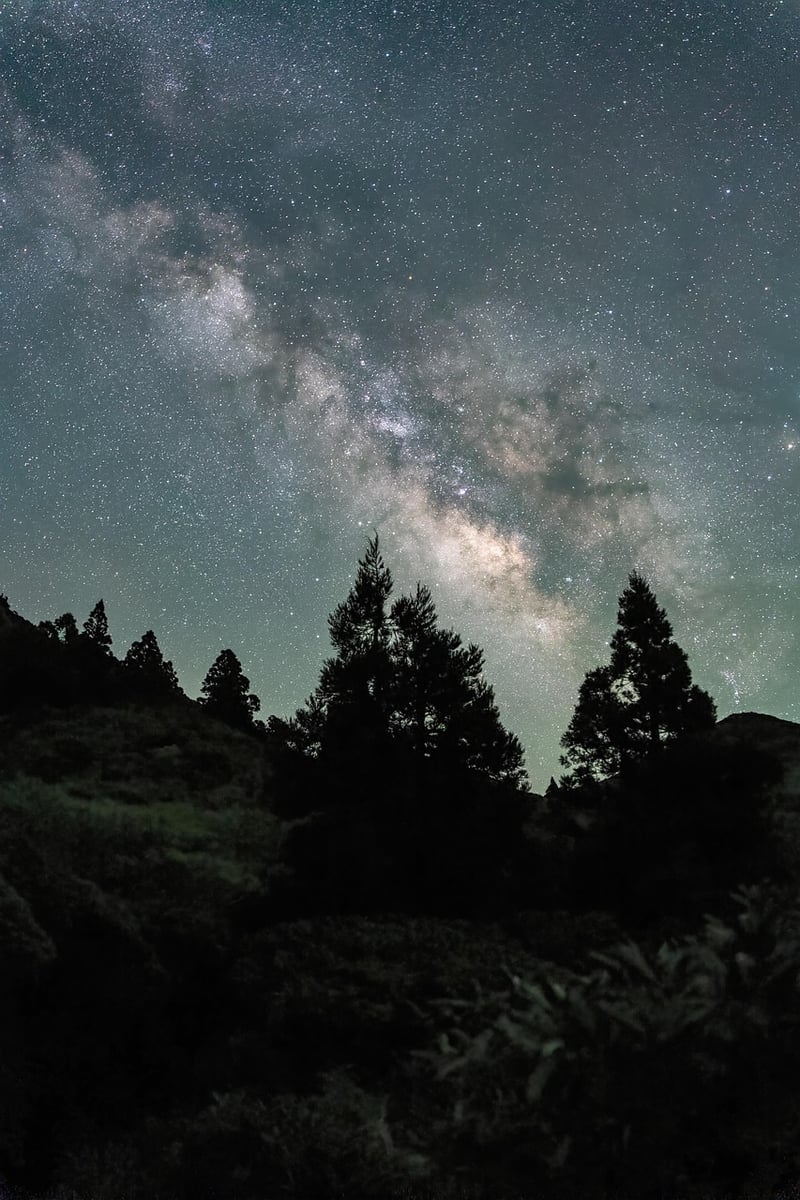 Woman meditating under the stars